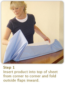 Step 1:
Insert product into top of sheet from corner to corner and fold outside flaps inward.